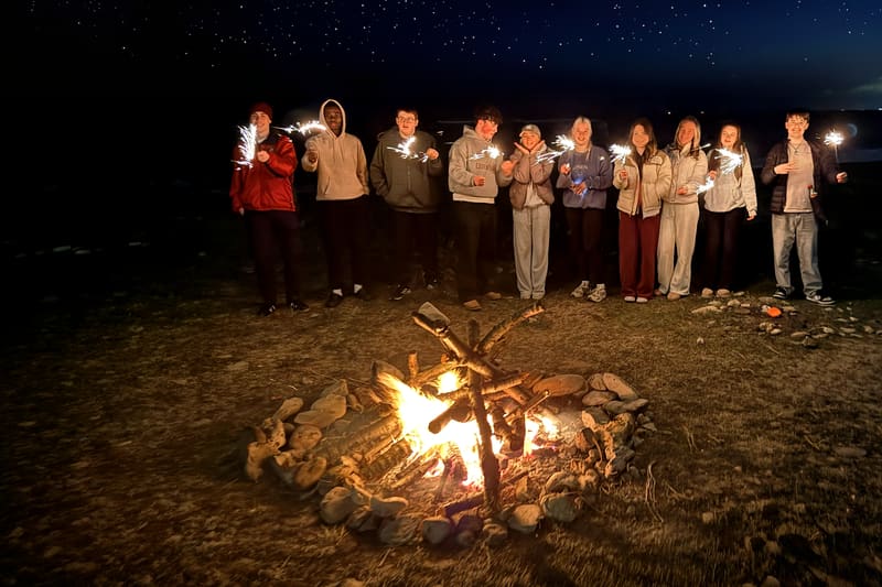 ROOT 66 campfire and sparklers at the coast